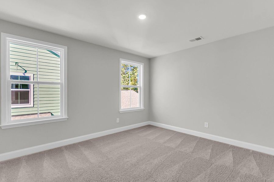 Spacious, unfurnished interior of a new home in Sweetgrass Station, Summerville (Image 22).