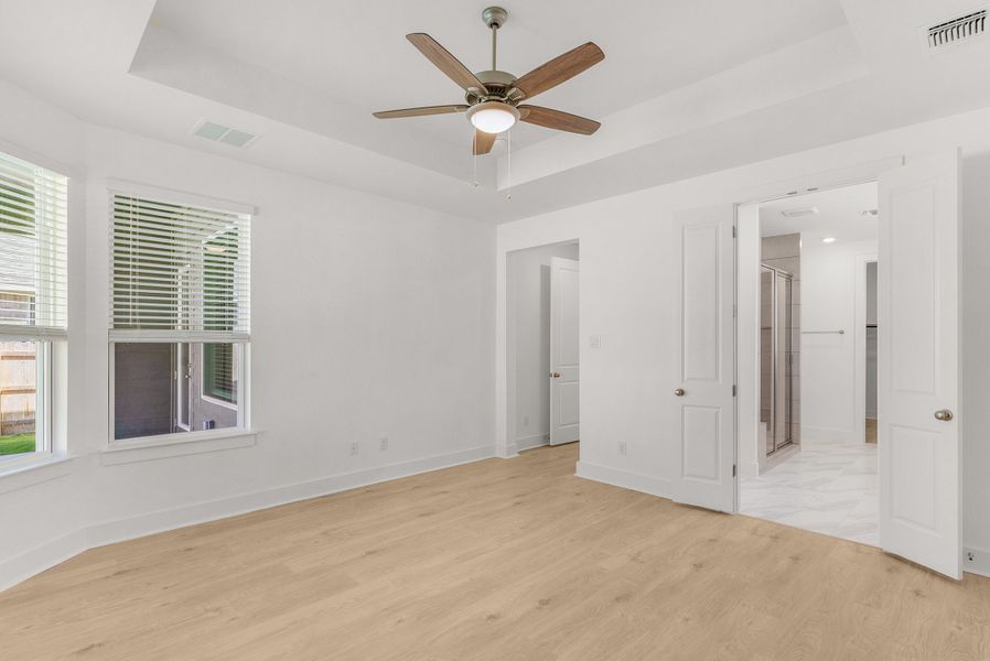 Spacious, unfurnished interior of a new home in Parkside on the River, Georgetown (Image 43).