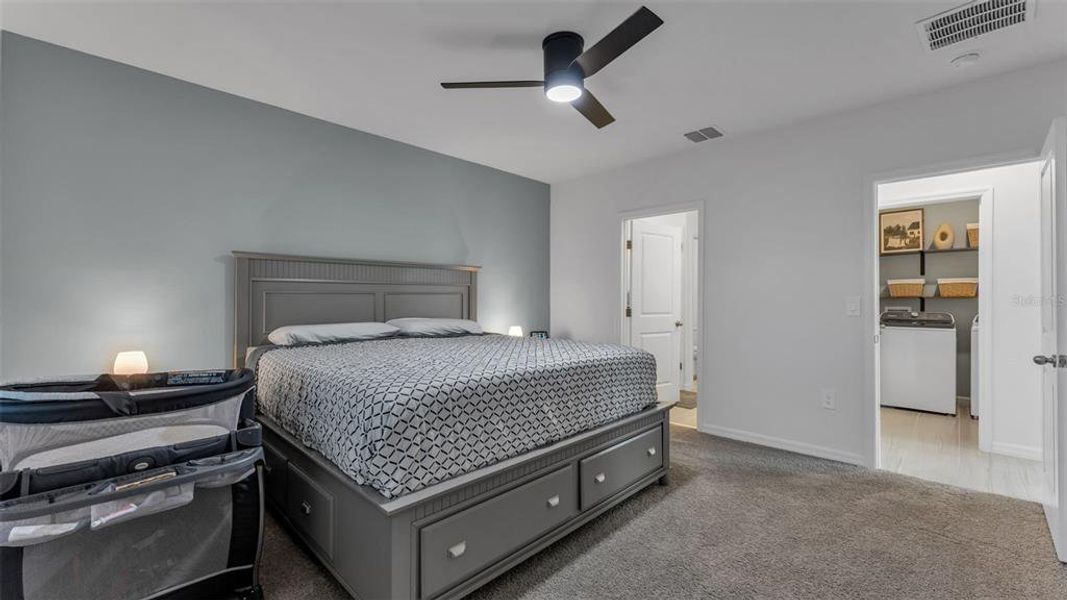 Furnished interior view inside a new home in The Grove at Stuart Crossing - Premier Series, Bartow (Image 11).
