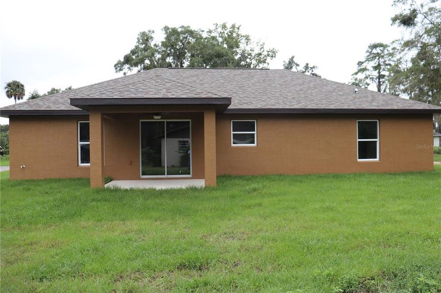 Exterior details and patio area of a home in , Ocala (Image 1).