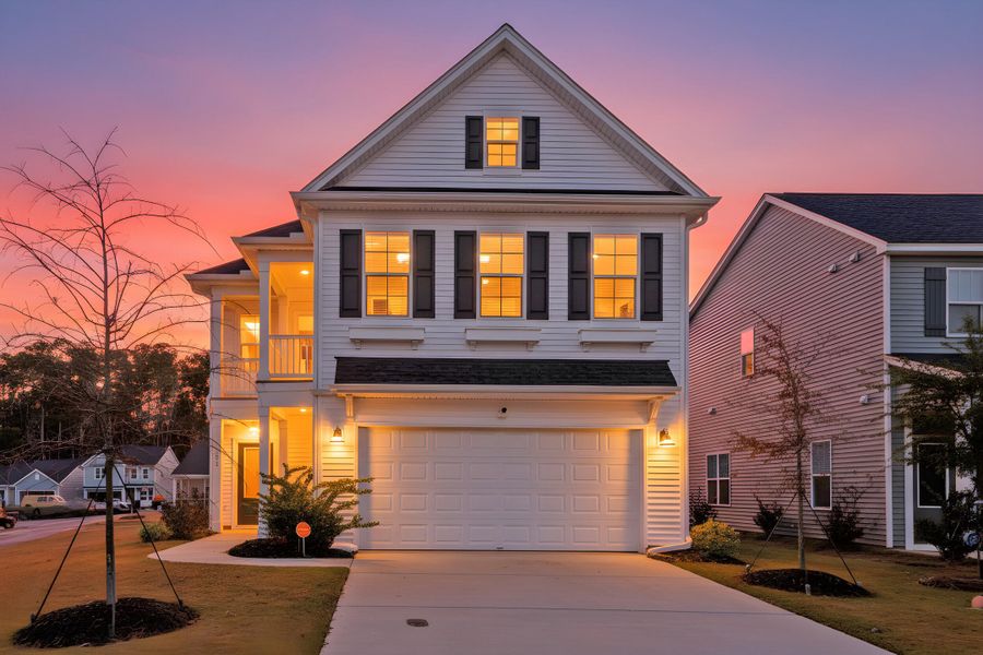 Front exterior of a new home in Six Oaks, Summerville, SC, highlighting curb appeal (Image 27). Front exterior of a new home in Six Oaks, Summerville, SC, highlighting curb appeal (Image 27).