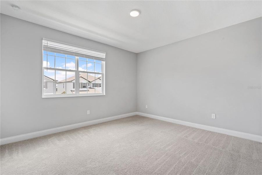 Spacious, unfurnished interior of a new home in Encore at Ovation, Winter Garden (Image 34).