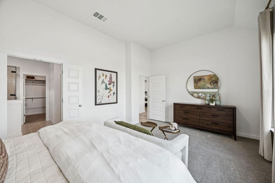 Primary Suite in the Trinity home plan by Trophy Signature Homes – REPRESENTATIVE PHOTO