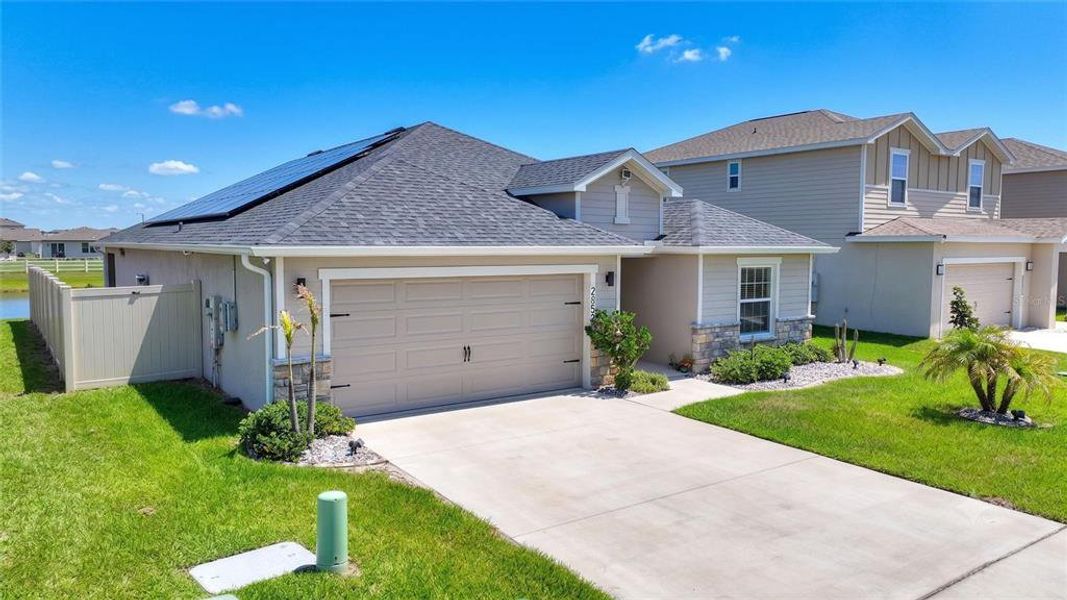 Front exterior of a new home in , Winter Haven, FL, highlighting curb appeal (Image 21).
