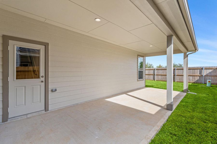 Exterior details and patio area of a home in Grand Oaks Village, Houston (Image 2). Exterior details and patio area of a home in Grand Oaks Village, Houston (Image 2).