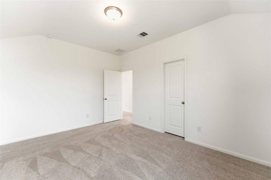 Spacious, unfurnished interior of a new home in Sunterra, Katy (Image 28).