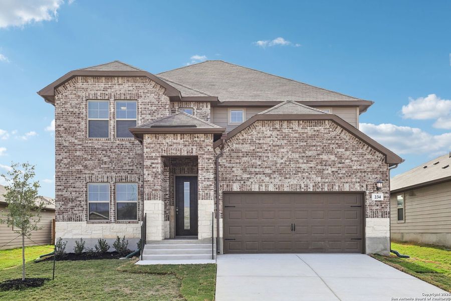 Front exterior of a new home in Legendary Trails - Classic Series, Cibolo, TX, highlighting curb appeal (Image 27). Front exterior of a new home in Legendary Trails - Classic Series, Cibolo, TX, highlighting curb appeal (Image 27).