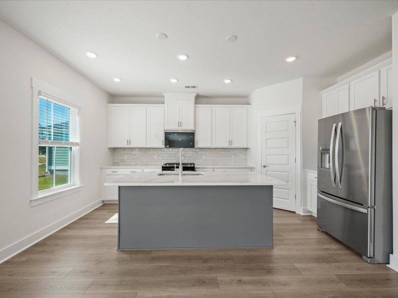 Furnished interior view inside a new home in The Coves at Lakes of Cane Bay II, Summerville (Image 3). Furnished interior view inside a new home in The Coves at Lakes of Cane Bay II, Summerville (Image 3).