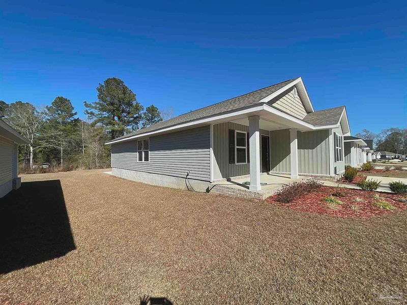 Exterior details and patio area of a home in Turtle Creek, Cantonment (Image 3).