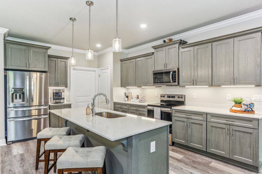 Representative furnished interior of a home built from the The Sapphire by Herbst Homes in Prosperity Point, Milton (Image 75).