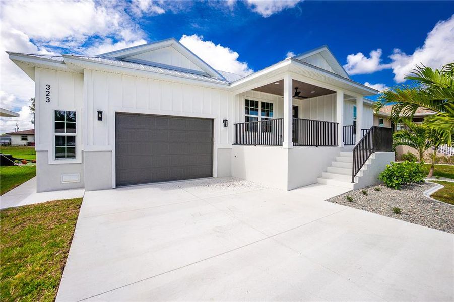 Front exterior of a new home in , Punta Gorda, FL, highlighting curb appeal (Image 27).