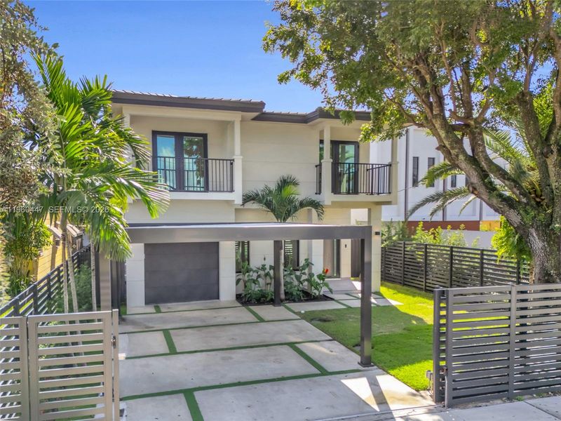 Front exterior of a new home in , Miami, FL, highlighting curb appeal (Image 24).