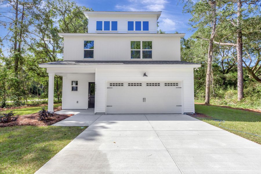 Front exterior of a new home in , Awendaw, SC, highlighting curb appeal (Image 25). Front exterior of a new home in , Awendaw, SC, highlighting curb appeal (Image 25).