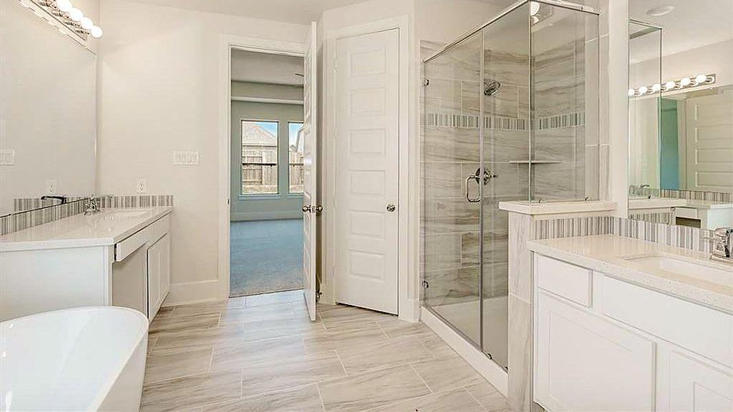 Furnished interior view inside a new home in Grand Central Park, Conroe (Image 10).