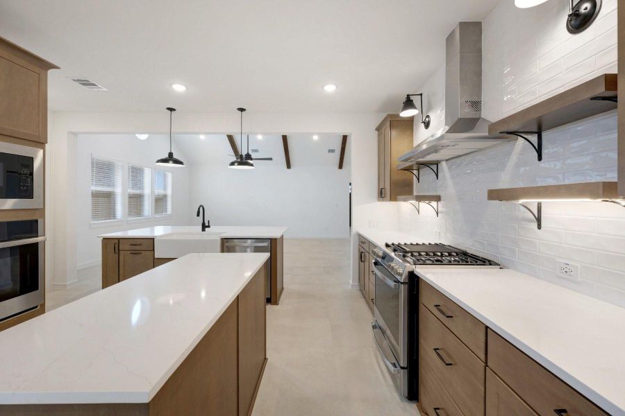 Stylish chestnut brown cabinets and quartz counters