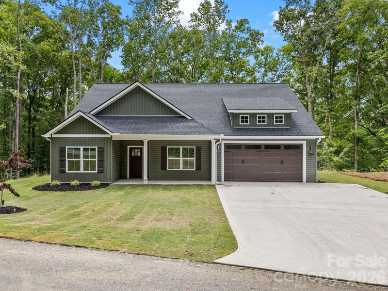 Front exterior of a new home in , Travelers Rest, SC, highlighting curb appeal (Image 23).
