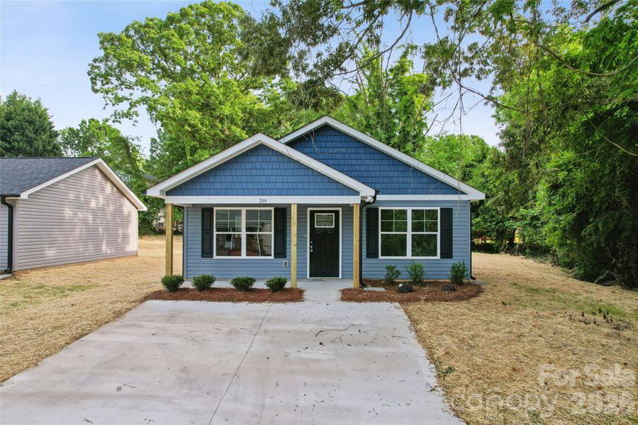 Front exterior of a new home in , Kannapolis, NC, highlighting curb appeal (Image 14).