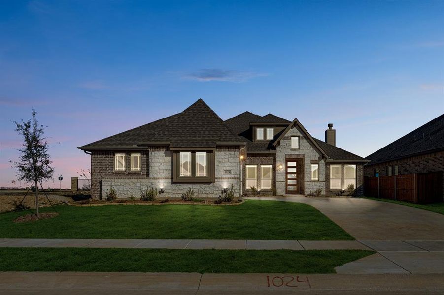 Front exterior of a new home in Timberbrook, Justin, TX, highlighting curb appeal (Image 25).
