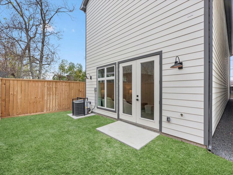 Exterior details and patio area of a home in , Houston (Image 3).