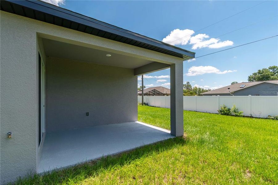 Exterior details and patio area of a home in , Ocala (Image 21).