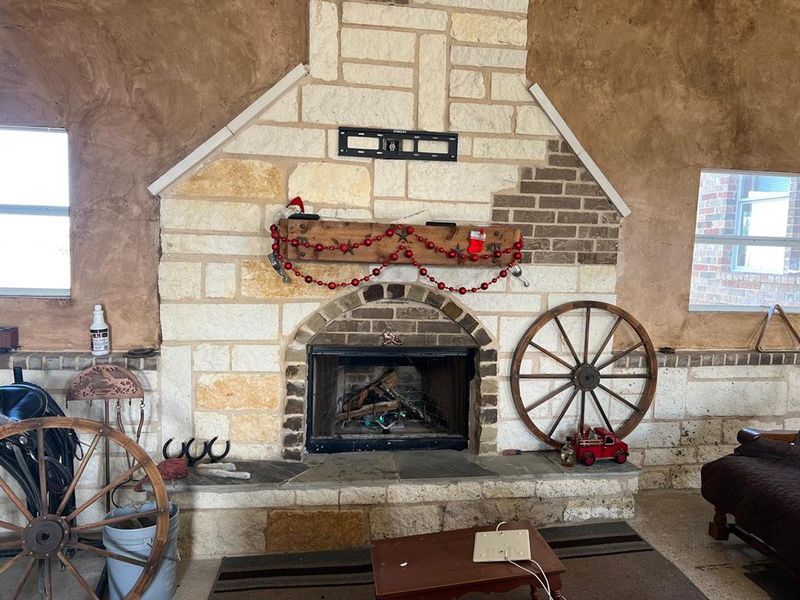 Living room featuring plenty of natural light and a fireplace