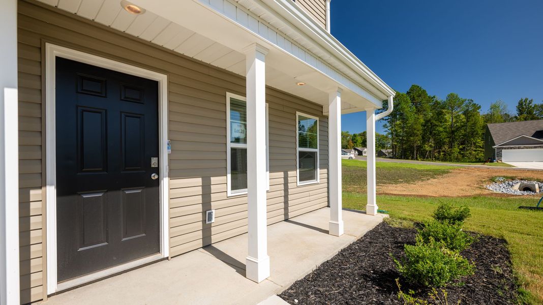 Front exterior of a new home in Hawk's Ridge, Rossville, GA, highlighting curb appeal (Image 20).