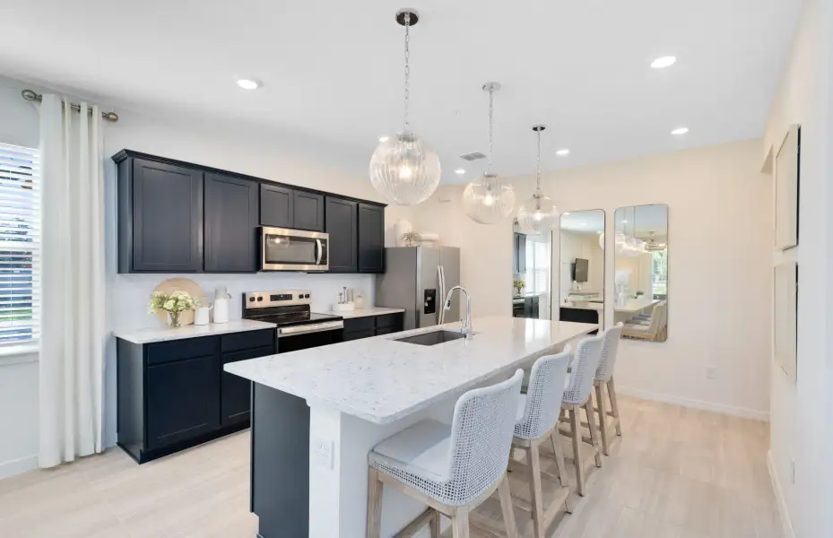 Representative furnished interior of a home built from the Julep by Pulte Homes in Crescent Ridge, Apopka (Image 9).