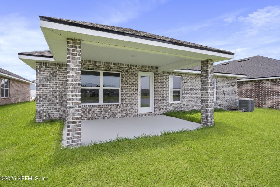 Front exterior of a new home in Shadow Crest at Rolling Hills, Green Cove Springs, FL, highlighting curb appeal (Image 2). Front exterior of a new home in Shadow Crest at Rolling Hills, Green Cove Springs, FL, highlighting curb appeal (Image 2).