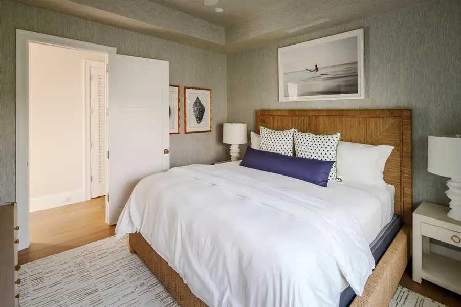 28 - Bedroom with rattan headboard, whit