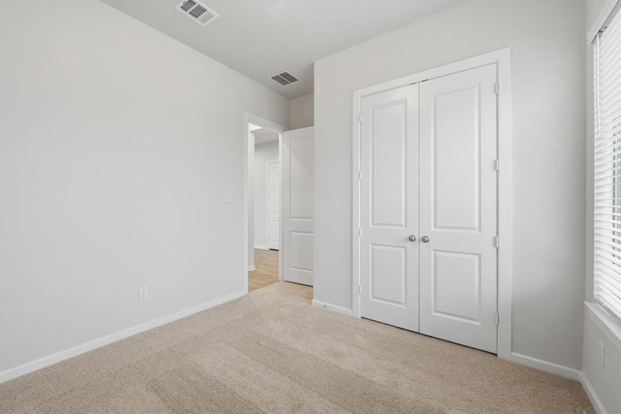 Spacious, unfurnished interior of a new home in Canterra Creek  60', Iowa Colony (Image 35).