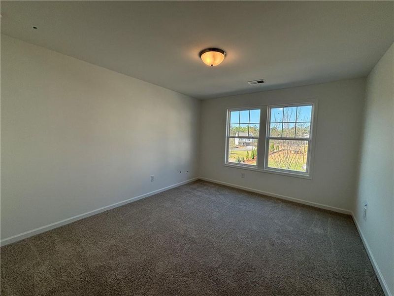 Spacious, unfurnished interior of a new home in Arbors at Richland Creek, Buford (Image 12).