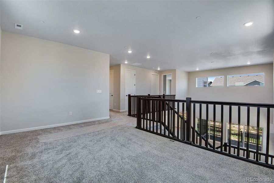 Spacious, unfurnished interior of a new home in Reunion Ridge, Commerce City (Image 19).