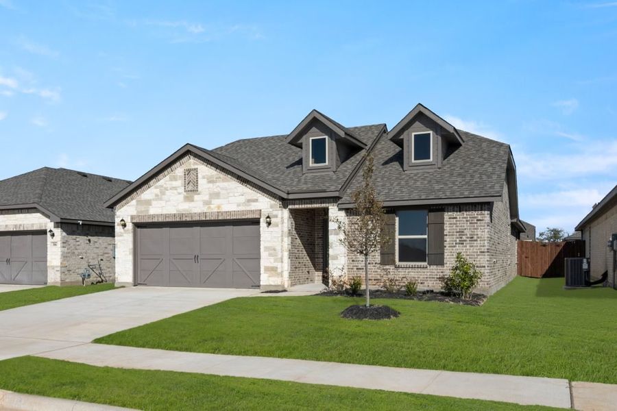 Representative exterior photo of a completed home built from the Cheyenne by Impression Homes in Baker Farms, Cleburne, TX (Image 2).