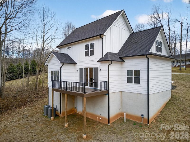 Exterior details and patio area of a home in , Troutman (Image 3).