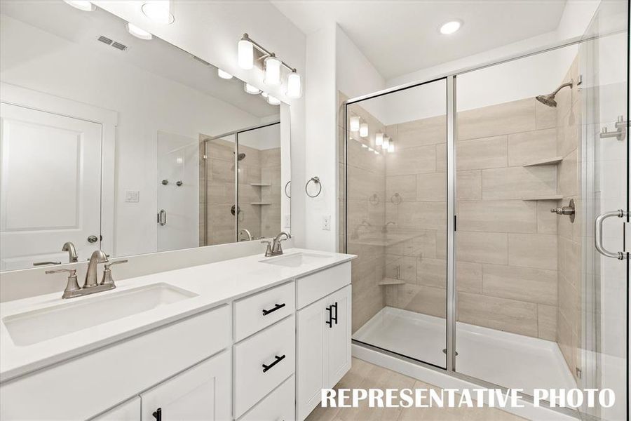 You'll never want to leave the oversized walk in shower in your new owner's bath!  REPRESENTATIVE PHOTO