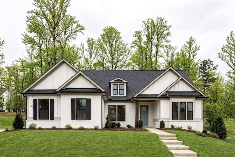 Front exterior of a new home in , Cumming, GA, highlighting curb appeal (Image 27).