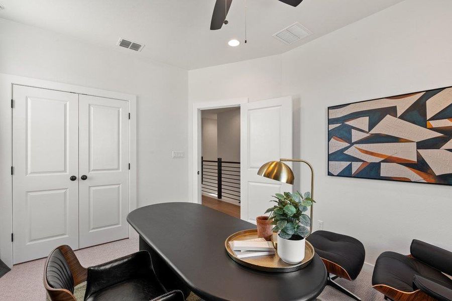 Flexible room with bright white walls, recessed lighting, and a ceiling fan
