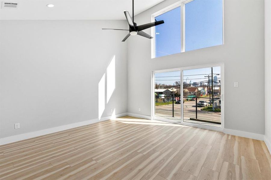 Primary Bedroom Floor to Ceiling Windows letting the outdoors in!