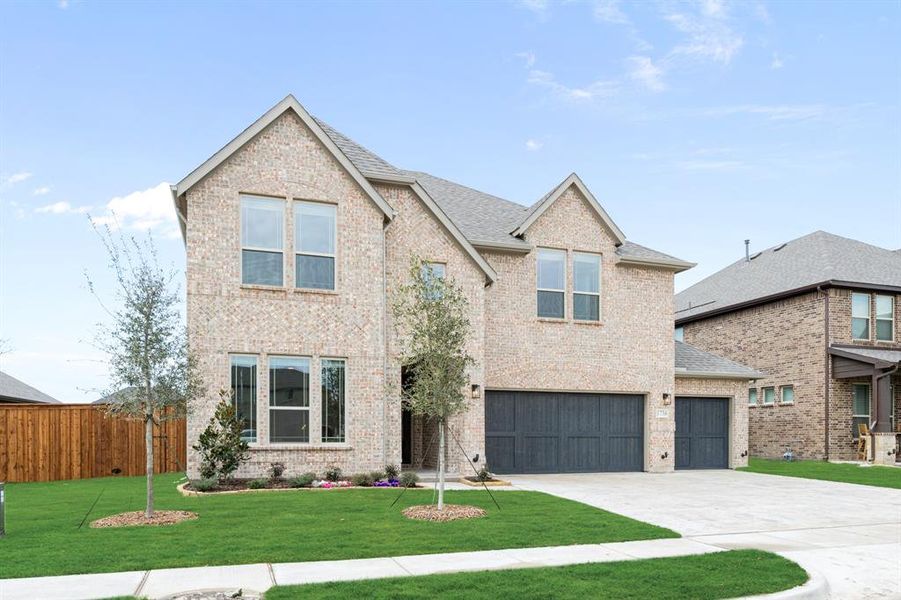 Front exterior of a new home in Sonoma Verde, Rockwall, TX, highlighting curb appeal (Image 2).