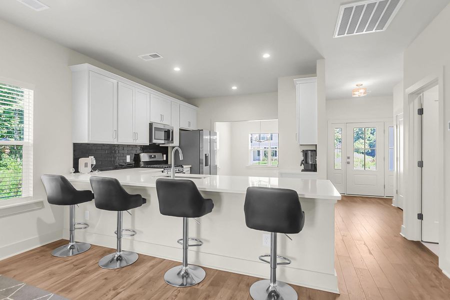Furnished interior view inside a new home in , North Charleston (Image 6).
