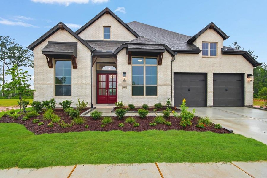 Front exterior of a new home in Two Step Farm, Montgomery, TX, highlighting curb appeal (Image 2).