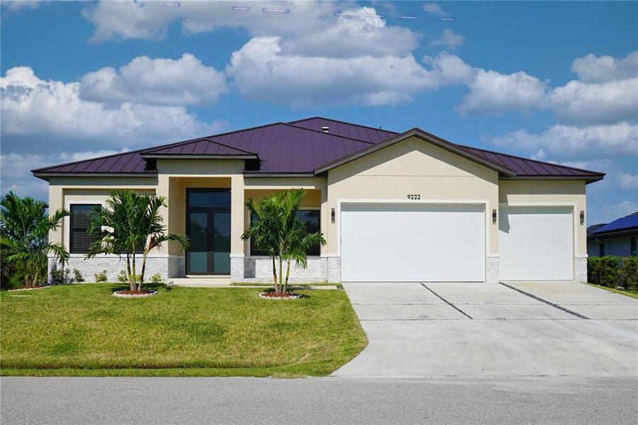 Front exterior of a new home in , Port Charlotte, FL, highlighting curb appeal (Image 1). Front exterior of a new home in , Port Charlotte, FL, highlighting curb appeal (Image 1).