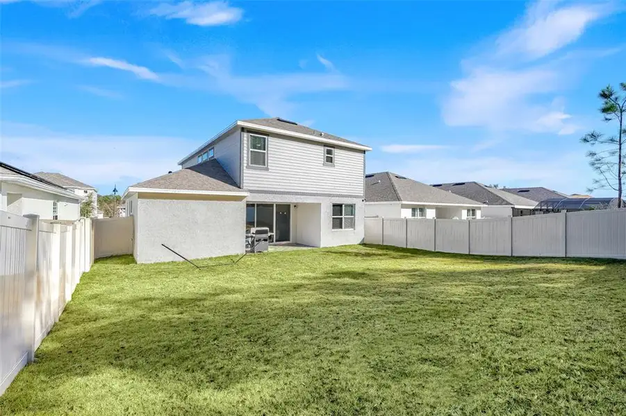 Exterior details and patio area of a home in Summerbrooke, Mount Dora (Image 3).