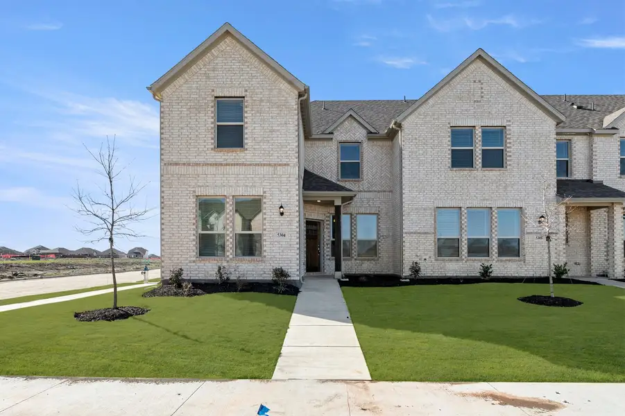 Representative exterior photo of a completed home built from the Conroe by Impression Homes in Timber Ridge, Corinth, TX (Image 1). Representative exterior photo of a completed home built from the Conroe by Impression Homes in Timber Ridge, Corinth, TX (Image 1).