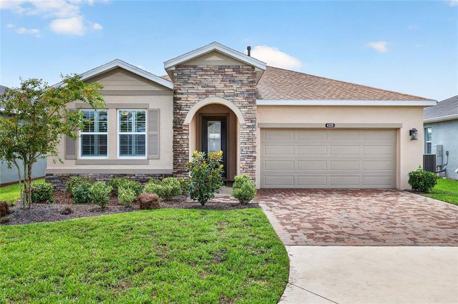 Front exterior of a new home in , Ocala, FL, highlighting curb appeal (Image 25).