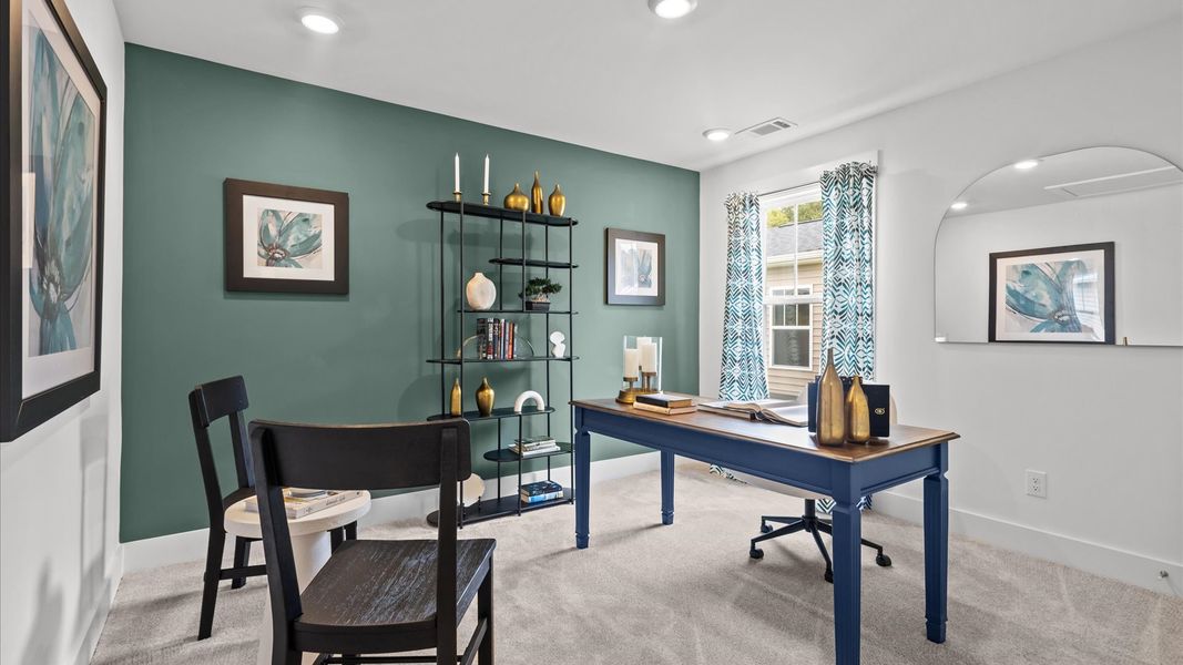 Refined home office design with a large window for daylight-filled mornings and peaceful views