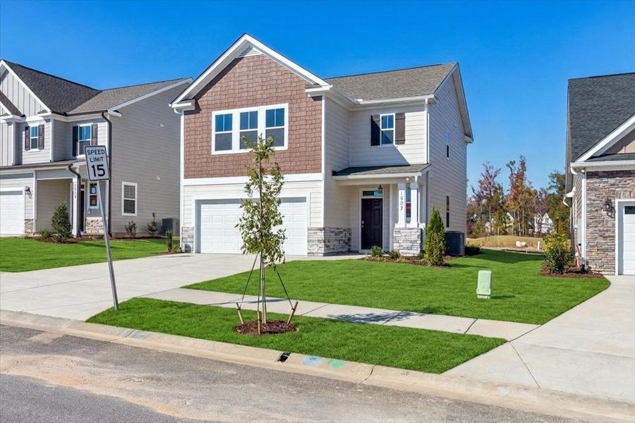 Front exterior of a new home in Tillery Park, Grovetown, GA, highlighting curb appeal (Image 22). Front exterior of a new home in Tillery Park, Grovetown, GA, highlighting curb appeal (Image 22).