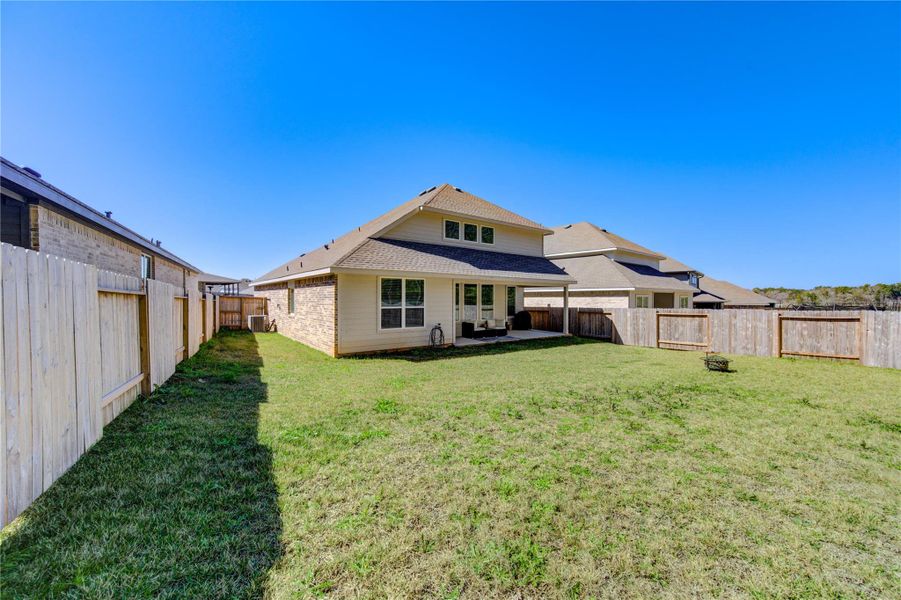 Front exterior of a new home in Fairwater, Montgomery, TX, highlighting curb appeal (Image 21). Front exterior of a new home in Fairwater, Montgomery, TX, highlighting curb appeal (Image 21).