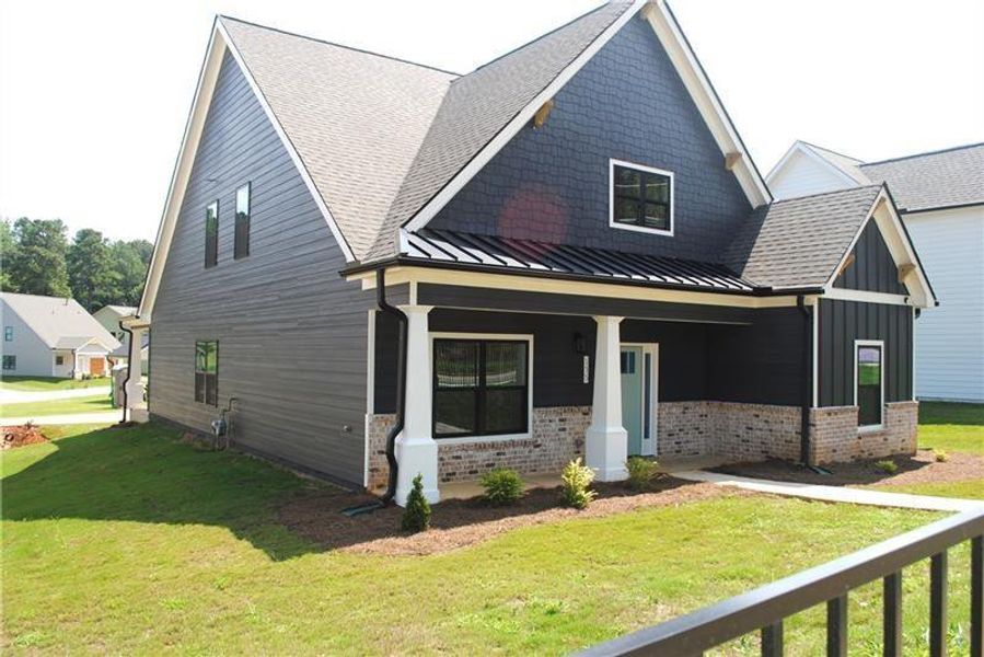 Exterior details and patio area of a home in Ferguson Corners, Emerson (Image 3).