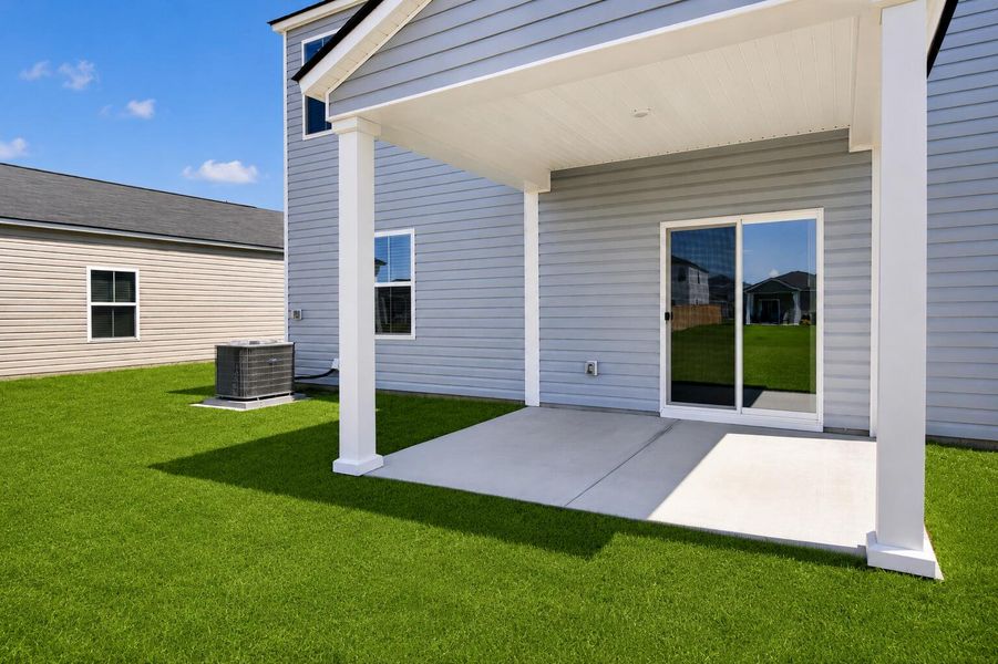 Exterior details and patio area of a home in Lindera Preserve at Cane Bay Plantation, Summerville (Image 16).